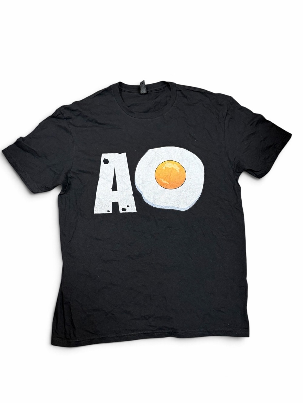 Black Graphic T-Shirt with Fried Egg Print